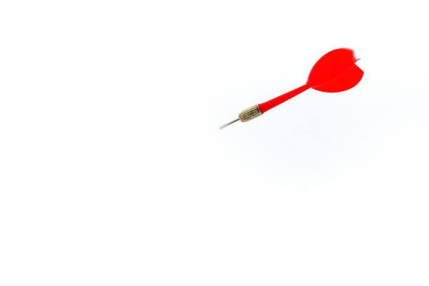 istock red dart sticking out of white space 1208854880