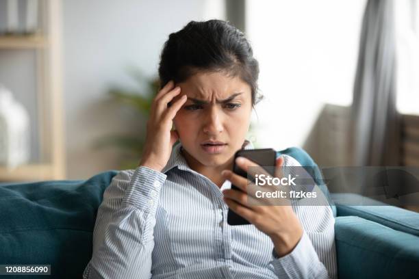 Frustrated Girl Feel Stressed With Cellphone Problems Stock Photo - Download Image Now