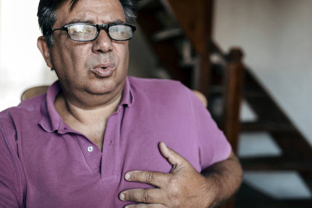 istock Man is Suffering from a Serious Pain in Chest 1208858882
