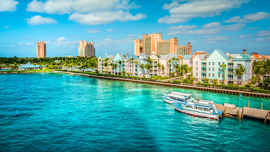 Skyline of Paradise Island with colorful houses at the ferry terminal. Nassau, Bahamas.