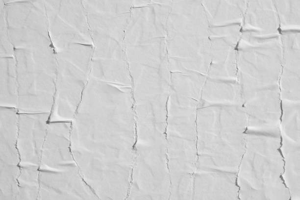 istock Crumpled white paper. Abstract background for the designer. 1208860889