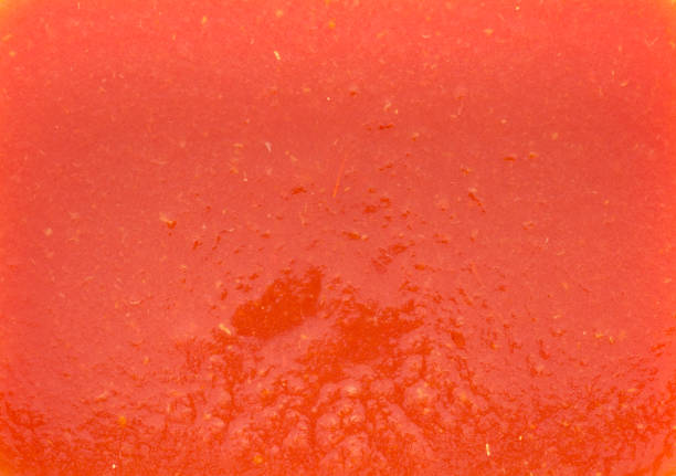 tekstura soku pomidorowego z miąższem w kształcie prostokątnym. czerwony to ciepły odcień o ledwo pomarańczowym odcieniu. - tinge zdjęcia i obrazy z banku zdjęć