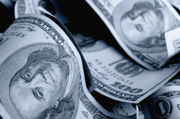 istock Cash US dollars black and white photo. 1208862327