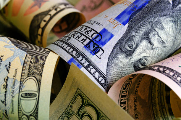 istock Cash US dollars. 1208863460