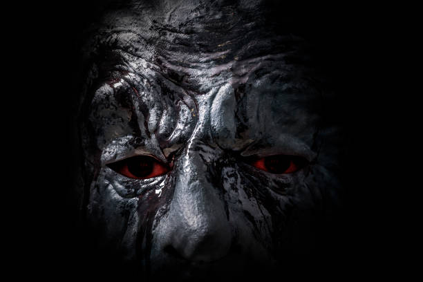 istock Scary figure with mask in the dark, macro shot 1208868238
