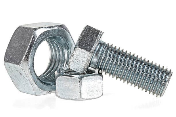 istock Industrial steel hardware - bolt and nuts isolated on a white background. 1208871690