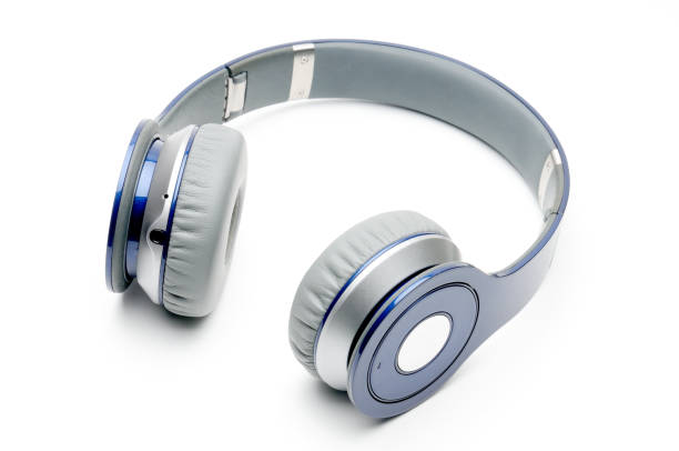 Modern headphones for listening to sound and music on a white background Modern headphones for listening to sound and music on an isolated white background vintage portable silver radio stock pictures, royalty-free photos & images