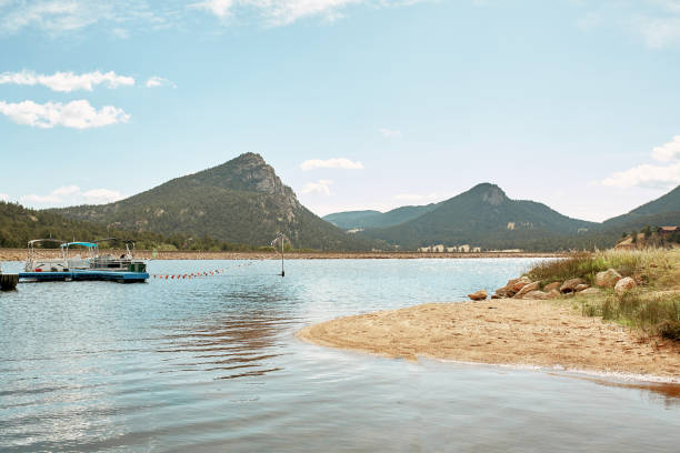 Lake Estes Trail path in Estes Park Colorado Estes Park, Colorado - September 6th, 2019:  Exterior of the Estes Park Resort along Lake Estes Trail. colorado rocky mountain national park lake mountain stock pictures, royalty-free photos & images