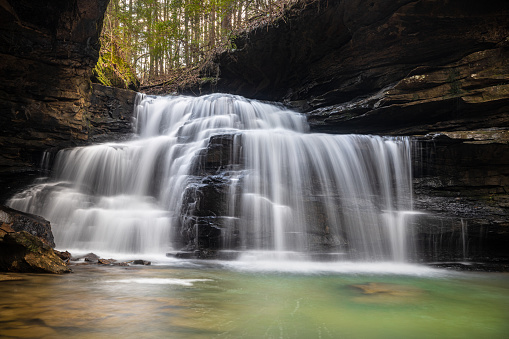 Mize Mill Falls is located in the Sipsey Wilderness section of the William B. Bankhead National Forest in southeastern Lawrence County. Mize Mill Falls is just off of the road east of the Sipsey River on Cranal Road.  You can hear the waterfall from the road, and the trail begins just across from a dirt road less than 1/2 a mile past the day use parking area near the river.