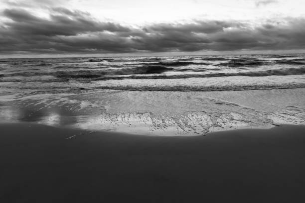 Ominous Waves Crash into the Beach