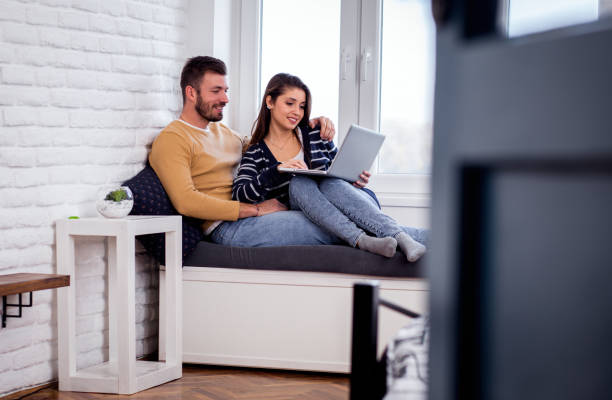 istock Young couple spending time together at home. 1208876662