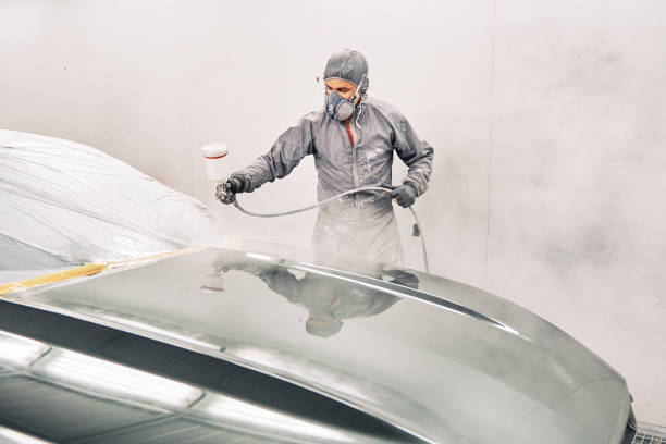 istock A man painting a car 1208883753