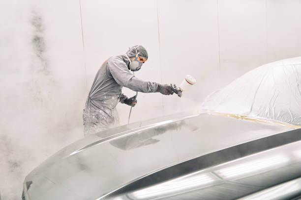 istock A man painting a car 1208883763