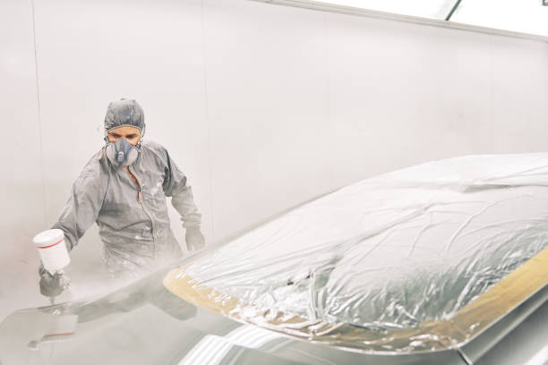 istock A man painting a car 1208883769