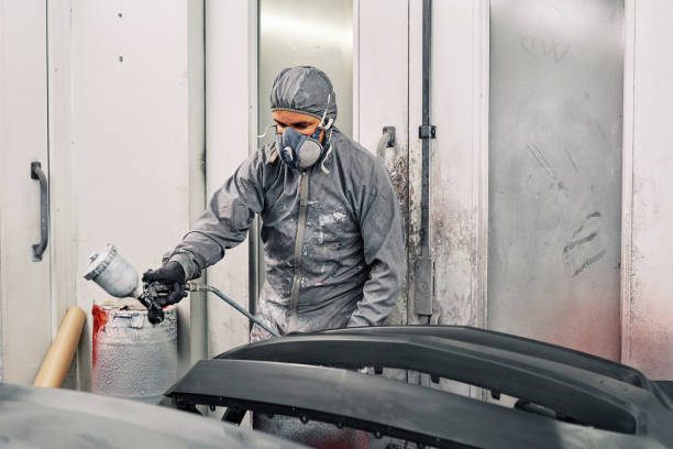 istock A man painting a car 1208883788