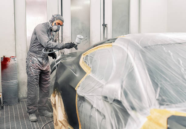 istock A man painting a car 1208883790