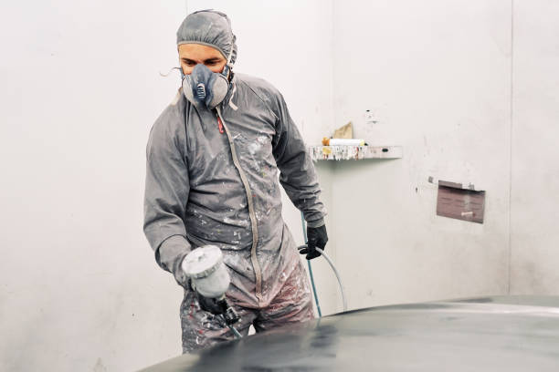 istock A man painting a car 1208883792