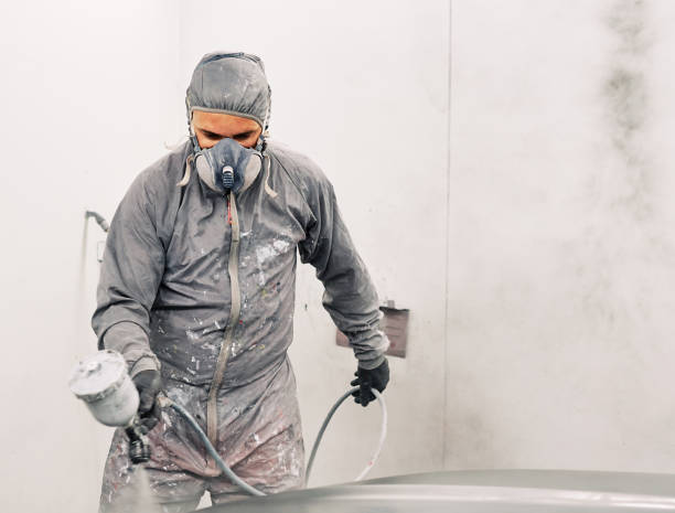 istock A man painting a car 1208883793