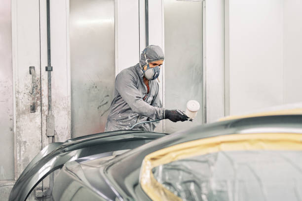 istock A man painting a car 1208883794