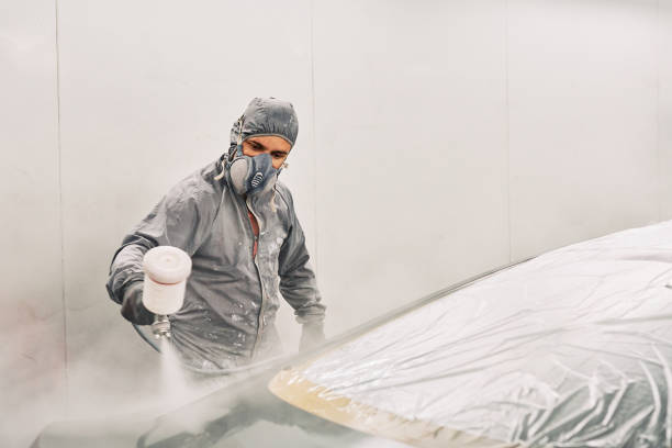 istock A man painting a car 1208883800