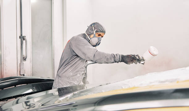 istock A man painting a car 1208883802