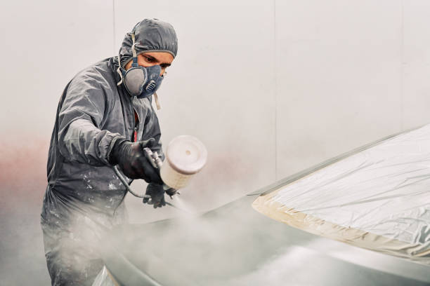 istock A man painting a car 1208883807