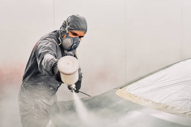 istock A man painting a car 1208883809