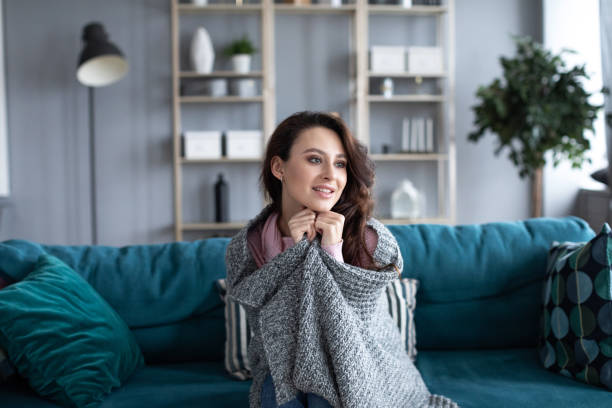 istock Girl in a plaid indoors. 1208883895