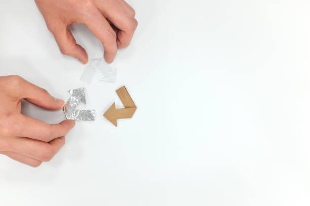 istock Recycling symbol flat lay composition in white background. 1208890460