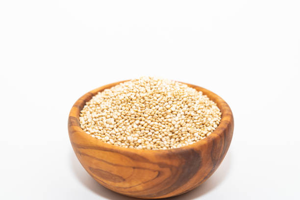 istock Raw quinoa in a wooden bowl 1208892279