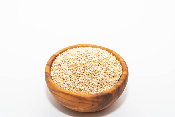 istock Raw quinoa in a wooden bowl 1208892296