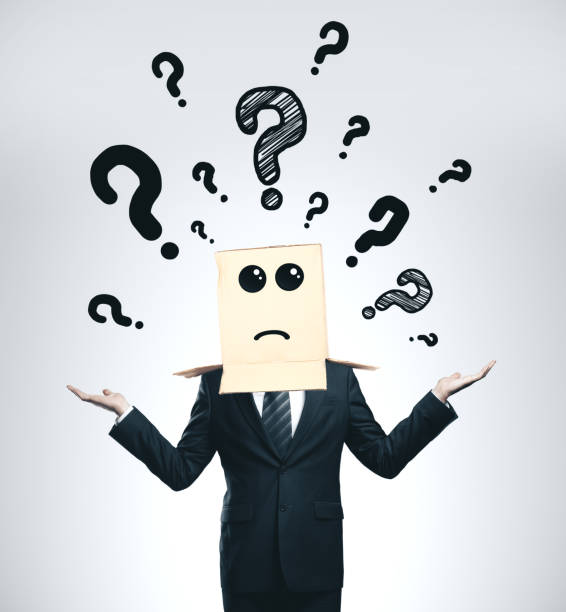 istock Businessman with drawing question mark on box 1208904318
