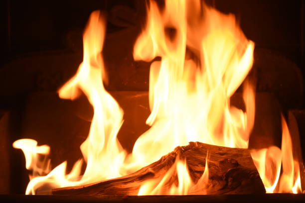 istock Dancing flames of a Festive log fire. 1208907230