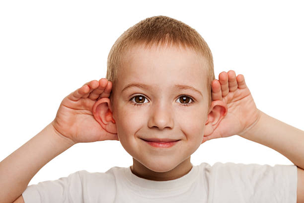 お子様を聞く - listening human ear communication human hand ストックフォトと画像