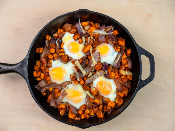 istock Sweet Potato Hash with Baked Eggs 1208909048