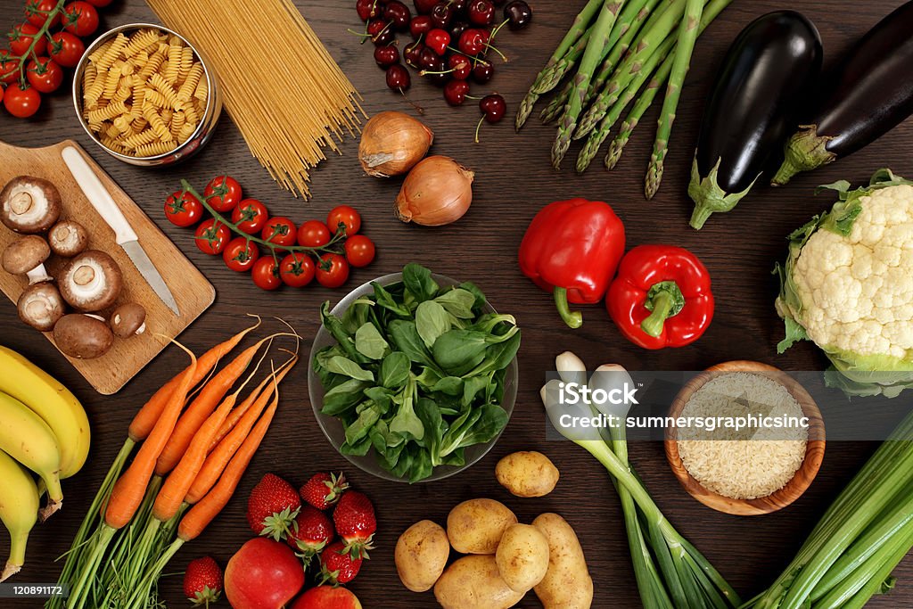 Healthy eating Photo of a table top full of fresh vegetables, fruit, and other healthy foods. Celery Stock Photo