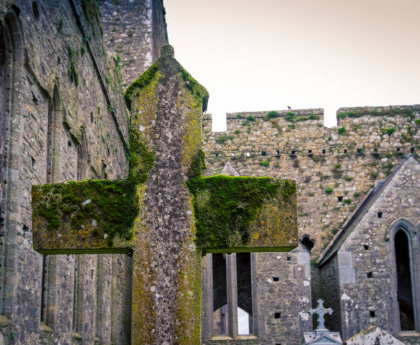 istock stone cross in rock of cashel 1208917639