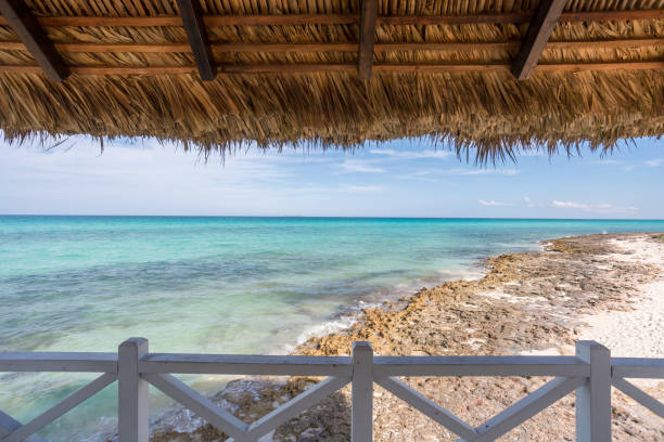 Beautiful Gazebo On Tropical White Sandy Beach. The gazebo offers a beautiful view of the turquoise cristal clear water. Caribbean Sea, Cuba.