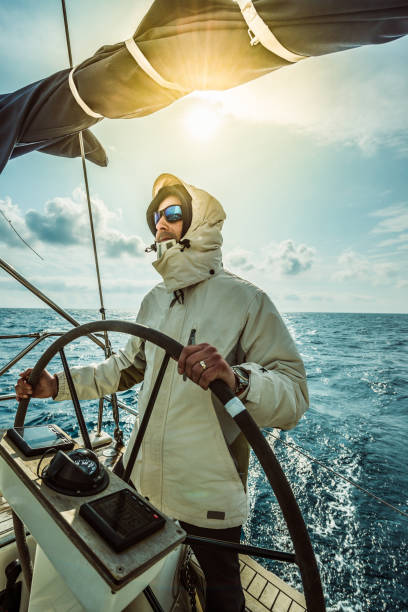 istock adventure man sailing on Aadriatic sea 1208933569