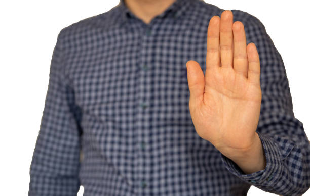 istock male hand showing stop gesture 1208942061