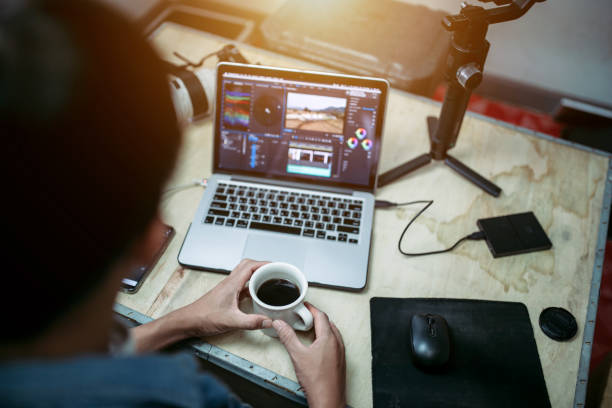 Content creator desk and equipment coffee cup and a laptop external hard disk in the house studio Content creator desk and equipment coffee cup and a laptop external hard disk in the house studio external hard disk drive stock pictures, royalty-free photos & images