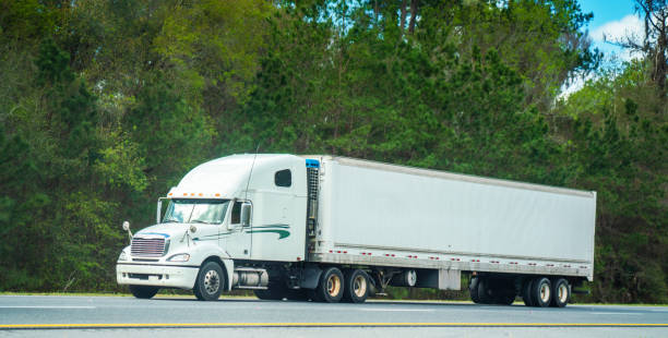 istock White semi truck Florida highway 1208952036