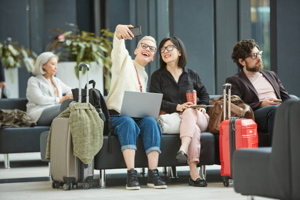 istock Girls Taking Selfie In Airport 1208953201