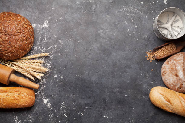 istock Various bread with wheat, flour and cooking utensils 1208956218