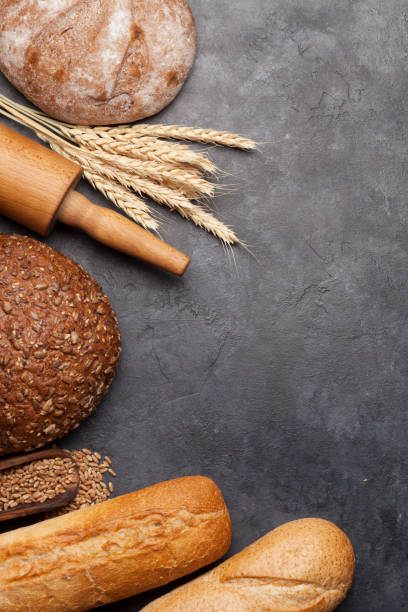 istock Various bread with wheat, flour and cooking utensils 1208956742