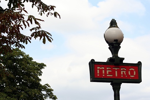 View of a Metro station signpost in Paris near the Trocadero.  Photo taken during a summer trip to Paris in 2012