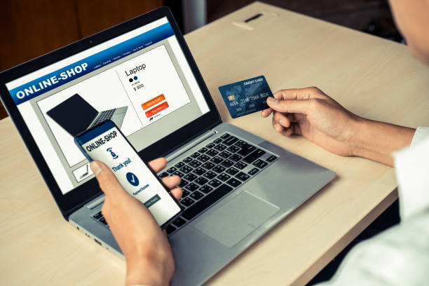 istock Young man use credit card for online shopping 1208961738