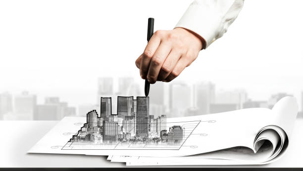 City civil planning and real estate development. City civil planning and real estate development - Architect people looking at abstract city sketch drawing to design creative future city building. Architecture dream and ambition concept. civil engineering photos stock pictures, royalty-free photos & images