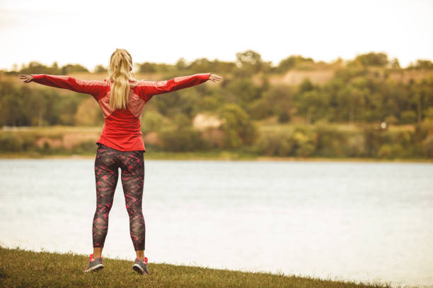 istock Copy space of woman warming up before her work out 1208963574