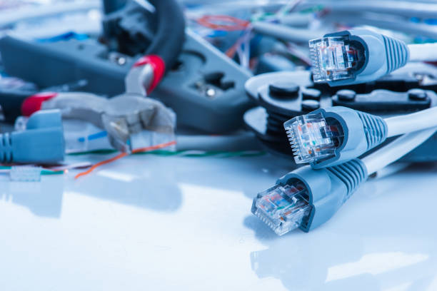 istock Tools and cables used in service of network ethernet patch cord 1208966821